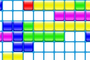 Bloques de colores en una cuadrícula azul y blanca con bloques rojos, amarillos, verdes, azules y rosas