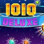 Título 1010 Deluxe con fondo estrellado y gemas brillantes de colores