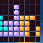 Cuadrícula de bloques de colores brillantes apilados en un patrón de filas y columnas sobre un fondo oscuro