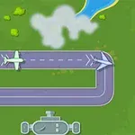 Dos aviones en una pista de aterrizaje rodeada de vegetación y una pequeña porción de agua