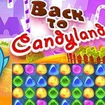 Personaje azul sonriente con un paisaje de fondo lleno de caramelos y un tablero de coloridas piezas brillantes