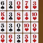 Varias cartas de juego ordenadas en una cuadrícula sobre un fondo marrón