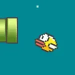 Pájaro pixelado amarillo volando cerca de un tubo verde en un fondo azul