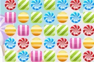 Dulces de colores brillantes alineados en filas sobre un fondo claro