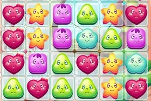 Caramelos coloridos con caras felices en forma de corazón, estrella y gota organizados en una cuadrícula