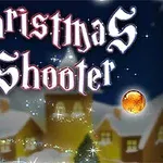 Texto Christmas Shooter con fondo de casas nevadas y esferas navideñas