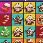 Galletas navideñas decoradas con formas de botas, casas, estrellas y bastones de caramelo sobre un fondo de colores brillantes