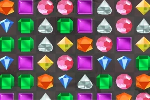 Joyas de diferentes colores y formas, como cuadrados, triángulos y diamantes, organizadas en una cuadrícula sobre un fondo oscuro