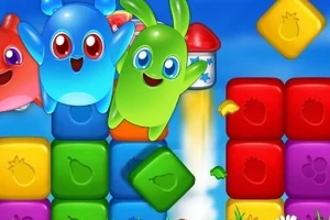 Criaturas coloridas y bloques de colores brillantes con ilustraciones de frutas sobre un fondo azul