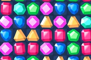 Filas de gemas de colores brillantes en diferentes formas sobre un fondo oscuro