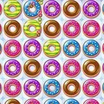 Fila de donas de colores brillantes con glaseados diversos y chispas