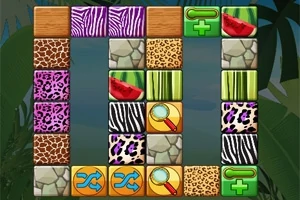 Bloques con patrones de animales y frutas alineados en una cuadrícula colorida