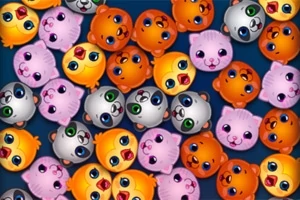Diversas caras redondas de animales coloridos con ojos grandes y expresiones simpáticas sobre un fondo azul