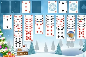 Cartas de naipes organizadas en columnas sobre un fondo invernal con árboles nevados y un árbol de Navidad decorado