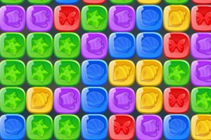 Cuadrícula de bloques de colores con formas de estrellas, mariposas, campanas y conchas