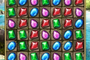 Gemas de colores rojo, verde, azul y rosa en una cuadrícula sobre un fondo texturizado