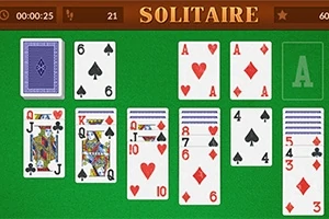 Juego de cartas sobre un fondo verde con cartas numeradas y de figuras en varias filas y columnas
