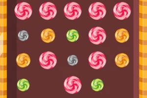 Dulces de colores en espiral organizados en filas sobre un fondo marrón