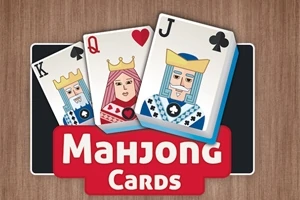 Tres cartas de juego con ilustraciones de un rey, una reina y un valete sobre un fondo de madera