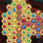Patrón de hexágonos dorados llenos de joyas de colores brillantes en distintos arreglos geométricos