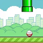 Un paisaje pixelado con un tubo verde y un personaje esférico sonriente en un entorno urbano