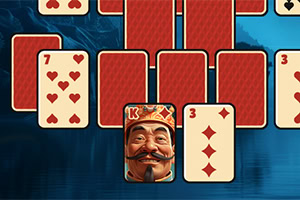 Cartas de juego con fondo azul, destacando un rey con dibujos de corazones