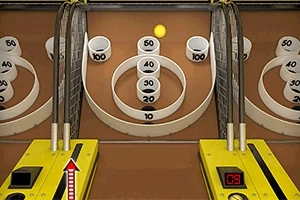 Juego de feria con bolas lanzadas hacia anillos de puntuación numerados