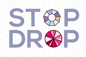 La imagen muestra las palabras STOP y DROP con letras grandes en color morado sobre un fondo con un patrón hexagonal, utilizando círculos segmentados multicolores dentro de las letras O