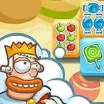 Caricatura de un personaje con corona comiendo, junto a fichas con imágenes de dulces