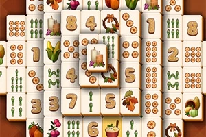 Azulejos con números, velas, hojas otoñales, y verduras en un diseño apilado sobre fondo marrón