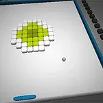Un tablero con bloques blancos y verdes en el centro, una pequeña esfera y una barra azul en la parte inferior