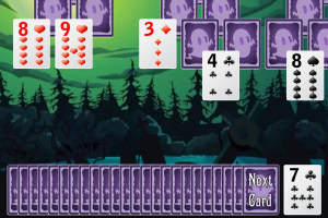 Cartas de juego numeradas y en colores rojo y negro sobre un fondo de bosque oscuro y misterioso