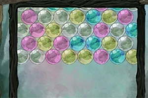 Fila de esferas de colores brillantes apiladas dentro de un marco oscuro