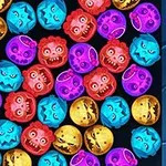 Calabazas coloridas con expresiones cómicas y aterradoras apiladas sobre un fondo oscuro